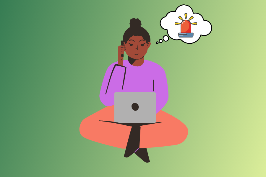 A person on a laptop on a suspicious phone call.